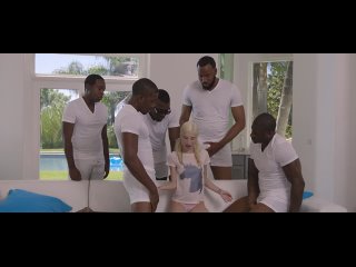 a petite blonde is fucked in a circle by blacks with huge dicks