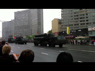 vehicles passing along novy arbat after the victory parade on may 9, 2012