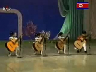 north korean teen playing guitar