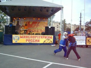 wushu (kungfu). staged duel (sanda). club of traditional wushu in st. petersburg